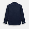 View 3 of product The Navy Linen Westminster Shirt by Turnbull & Asser features a classic collar and buttoned cuffs, exemplifying British craftsmanship. Shown here in long sleeves, the shirt is displayed flat against a white background.