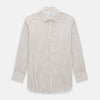 View 1 of product The Turnbull & Asser Coffee Multi Stripe Westminster Shirt features long sleeves, a button-up front, subtle beige and white stripes, a pointed Turnbull collar, and buttoned cuffs—expertly crafted in Britain and shown flat on a white background.