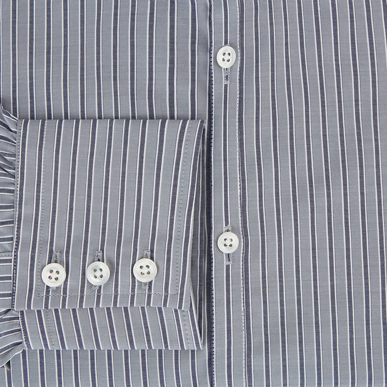 Image 4 of product The Turnbull & Asser Grey Ticking Stripe Westminster Shirt features thin vertical grey stripes and a classic collar, showcased against a plain white background.