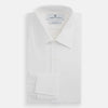 View 5 of product The Turnbull & Asser White Marcella Dress Shirt features a T&A collar, double cuffs, and pleated front detailing—ideal for formal occasions. Displayed on a plain white background.