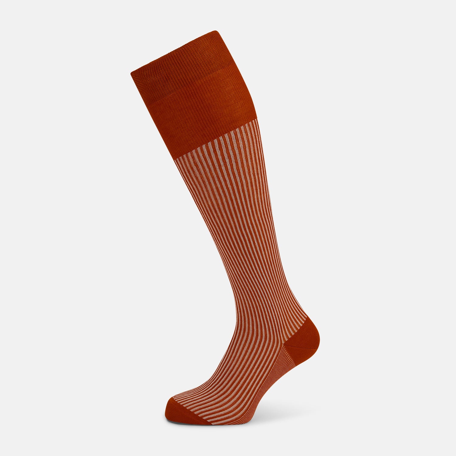 View 1 of product Turnbull & Asser's Rust/White Thin Striped Long Socks feature thin vertical stripes with a solid burnt orange cuff, heel, and toe. A single over-the-calf sock displayed on white background—ideal for those seeking stylish long socks.