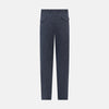 View 4 of product The Navy Striped Edmund trousers by Turnbull & Asser have a relaxed, straight-leg fit with front pleats, belt loops, and a single button waist closure, shown against a plain white background.