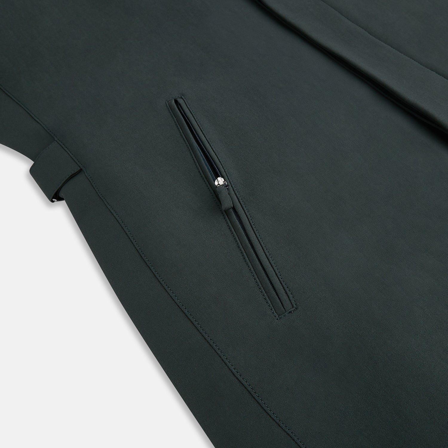 View 6 of product A Forest Green John Arthur Trench Coat by Turnbull & Asser, knee-length with a single-breasted button closure, three zippered pockets, and buttoned cuffs, is laid flat on a white background.