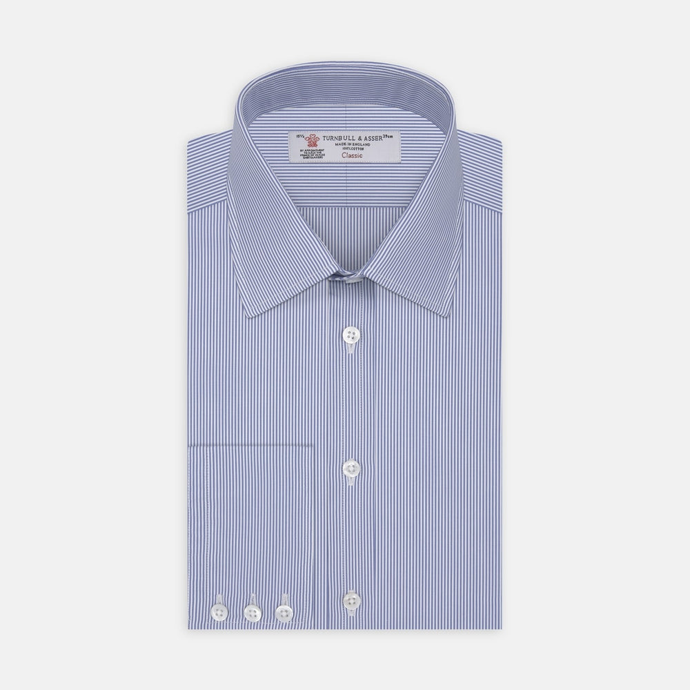 A circle with a gray border features evenly spaced, diagonal blue stripes on a white background, resembling Turnbull & Asser's Blue Fine Bengal Stripe Cotton Fabric. The stripes run from the top left to bottom right.