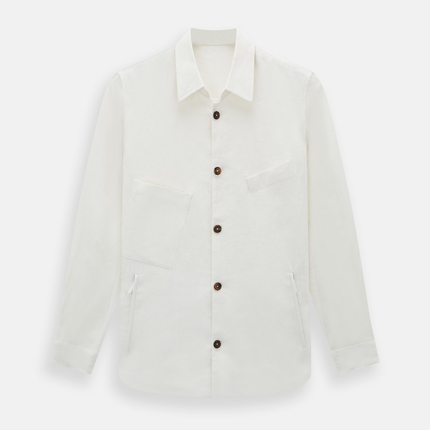 View 1 of product The Vanilla Linen Holland Shacket by Turnbull & Asser, a white Irish linen button-up with a collar, brown buttons, and four pockets, is laid flat on a white background—perfect as lightweight outerwear.