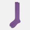 View 2 of product The Turnbull & Asser Violet Long Sock, crafted from mercerised Egyptian cotton, is shown in side profile against a white background, highlighting its knee-high length and ribbed texture.