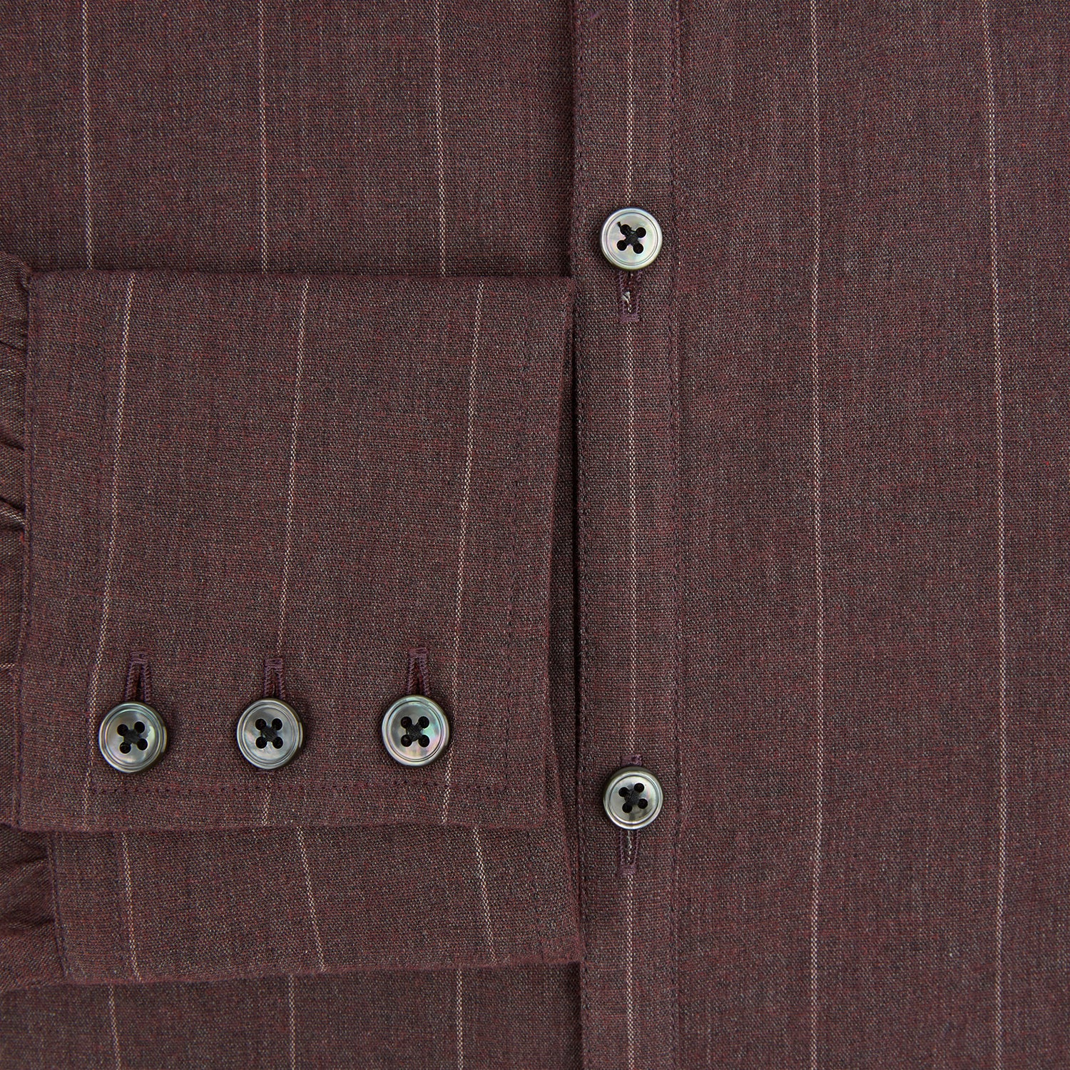 View 4 of product The Indies Red Wide Stripe Westminster Shirt by Turnbull & Asser features wide red stripes, a classic collar, and a tailored fit, reflecting British craftsmanship. Displayed against a white background.