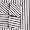 View 4 of product The Burgundy Multi Stripe Winston Gown by Turnbull & Asser features long sleeves, a shawl collar, waist belt, three pockets, and red piping accents for a classic Churchill-inspired touch.