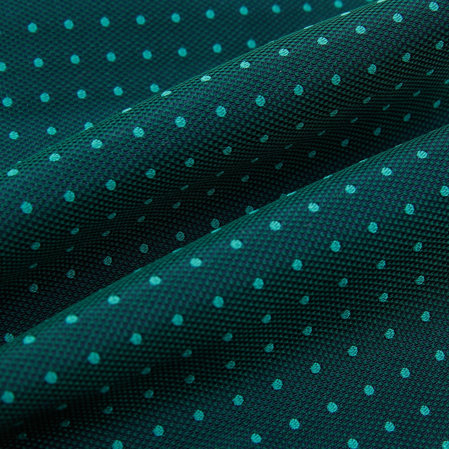 View 4 of product The Turnbull & Asser Turquoise and Forest Green Micro Dot Silk Cravat features a refined micro dot pattern, adding sophisticated style to formal looks. Displayed on a white background.