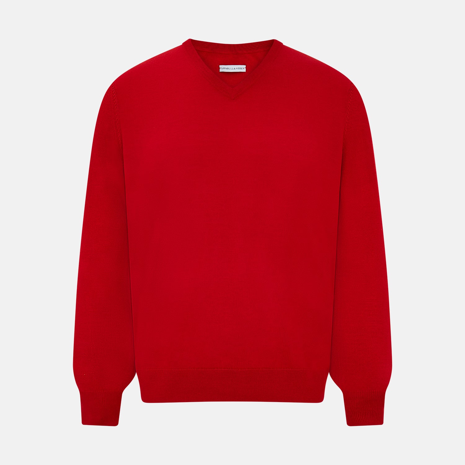 View 1 of product The Turnbull & Asser Red Fine Merino V-Neck Jumper, a classic long-sleeve knitwear piece, is shown on a white background.
