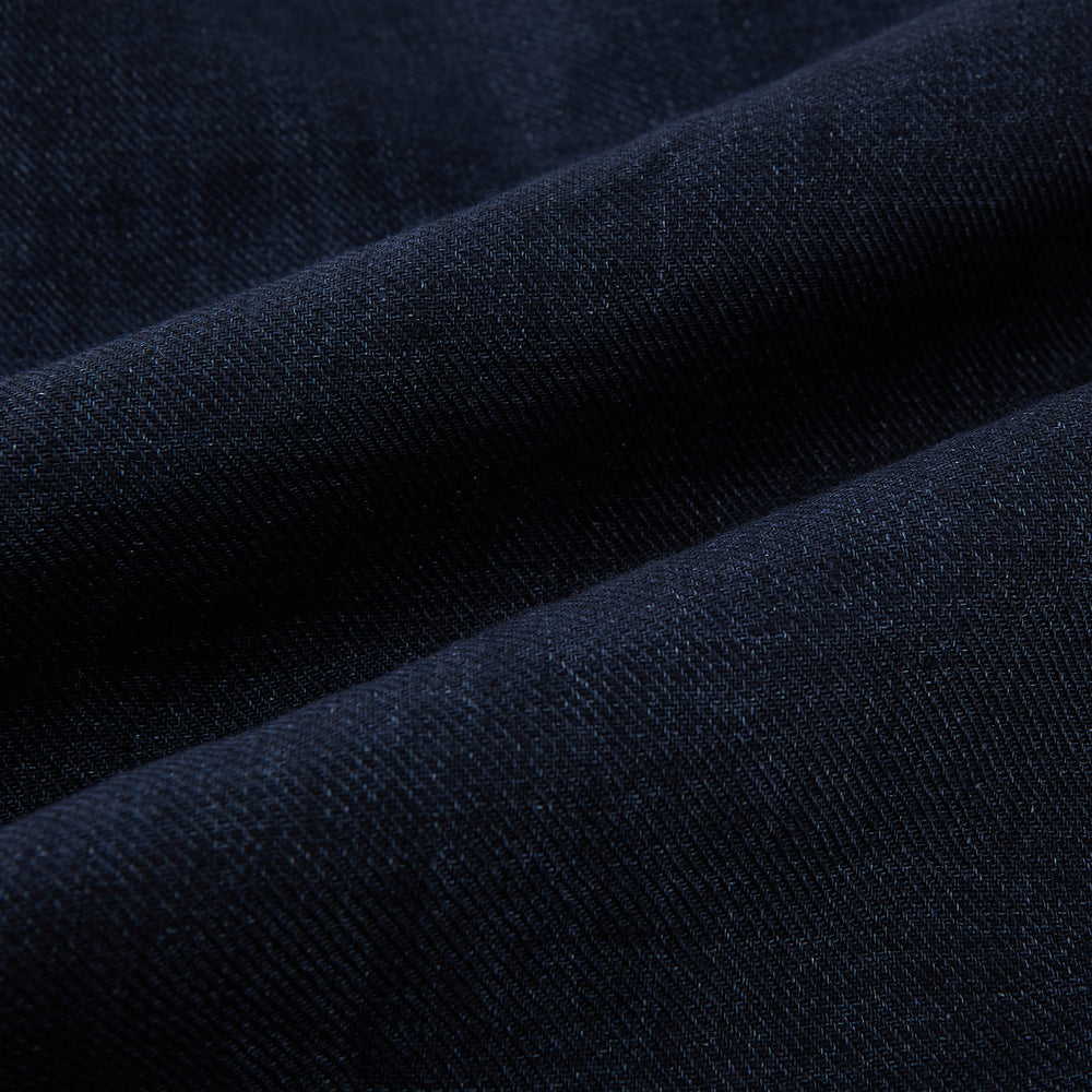The Navy Linen Windsor Shirt by Turnbull & Asser features long sleeves, white buttons, a Turnbull collar, and buttoned cuffs in dark navy blue linen. Shown laid flat on a white background.