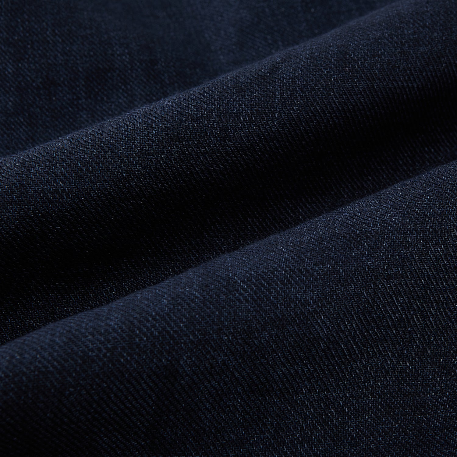 View 8 of product The Navy Linen Windsor Shirt by Turnbull & Asser features long sleeves, white buttons, a Turnbull collar, and buttoned cuffs in dark navy blue linen. Shown laid flat on a white background.