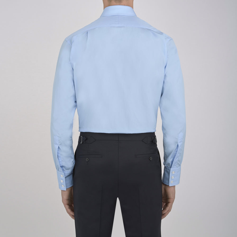 A Light Blue Cotton Shirt with a T&A collar and 3-button cuffs by Turnbull & Asser is displayed on a plain white background, ideal for pairing with a navy suit.