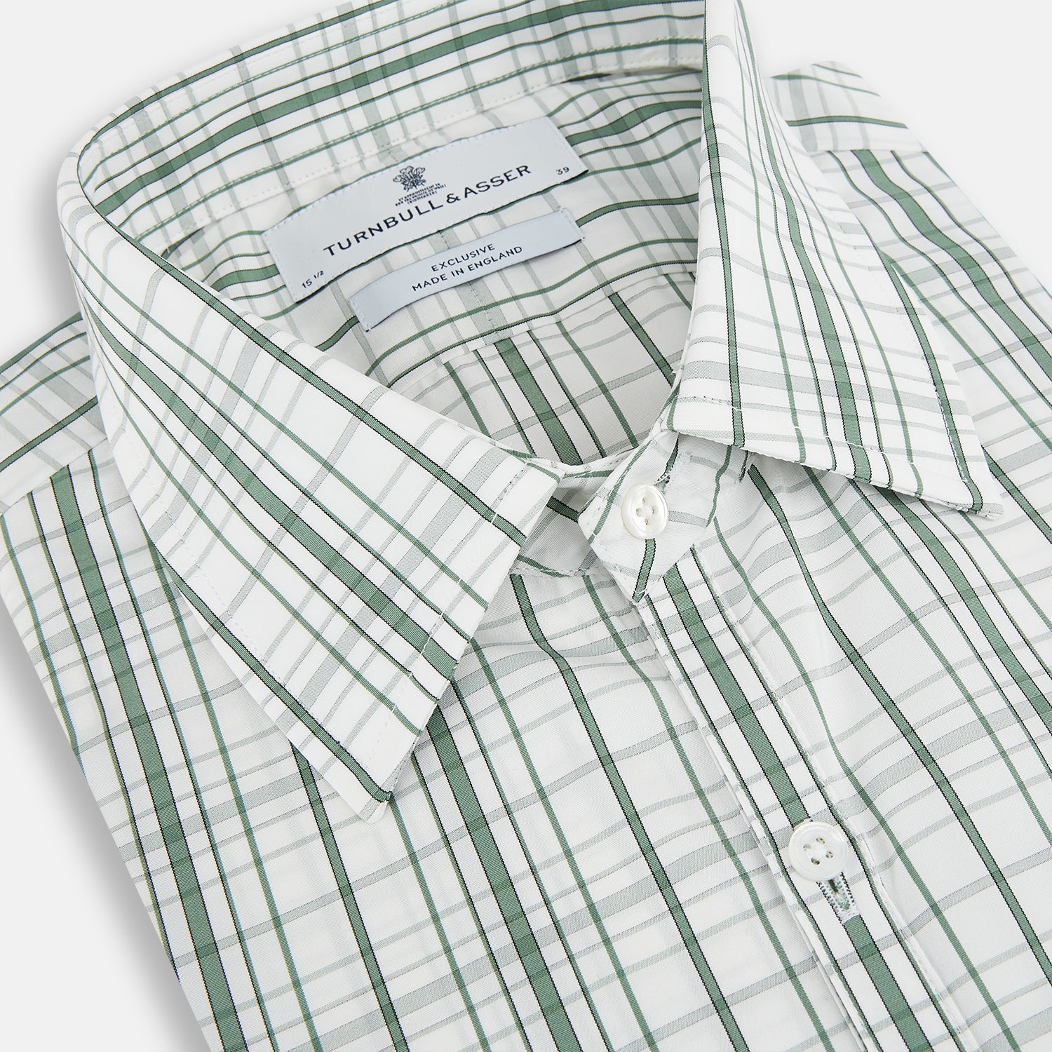 View 2 of product The Turnbull & Asser Sage Green Plaid Check Westminster Shirt features a collared, long-sleeve button-up design with a white base and sage green plaid pattern, showcasing classic British craftsmanship against a clean white background.
