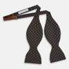 View 2 of product A stylish accessory, the White and Brown Micro Dot Silk Bow Tie by Turnbull & Asser features tiny brown dots on luxurious white silk, elegantly displayed against a plain white background.