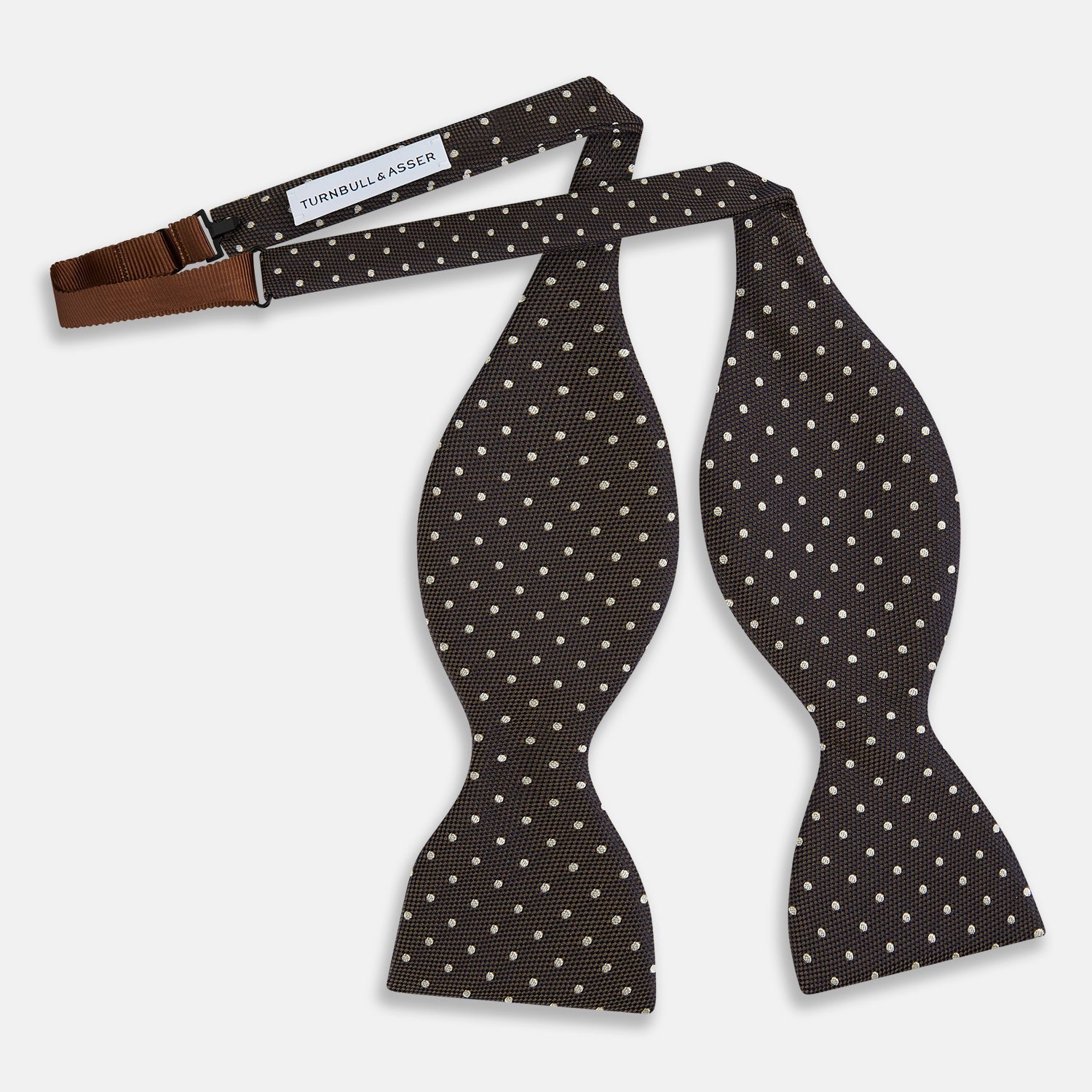 View 2 of product A stylish accessory, the White and Brown Micro Dot Silk Bow Tie by Turnbull & Asser features tiny brown dots on luxurious white silk, elegantly displayed against a plain white background.