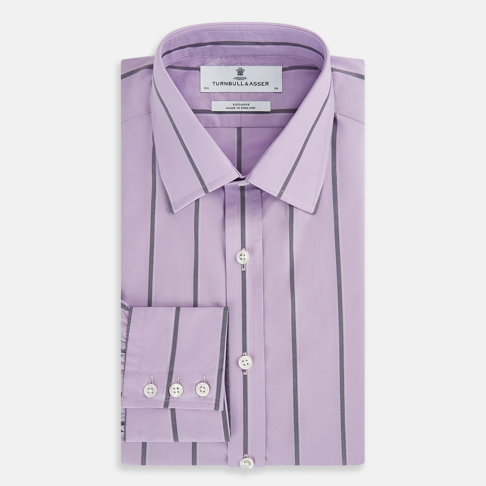 The Turnbull & Asser Lilac Track Stripe Mayfair Shirt is a long-sleeve Italian cotton shirt in light purple with dark lilac vertical stripes, shown laid flat on a white background.