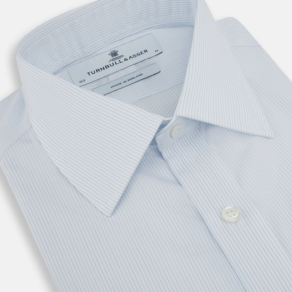 The Turnbull & Asser Blue and White Thin Stripe Shirt features a T&A collar and double cuffs, shown against a plain white background.