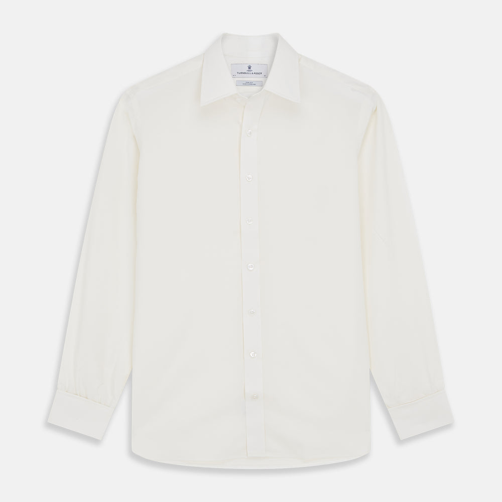 The Turnbull & Asser Cream Silk Tailored Fit Shirt is a long-sleeve button-up with a pointed collar and buttoned cuffs, displayed laid flat against a plain white background.