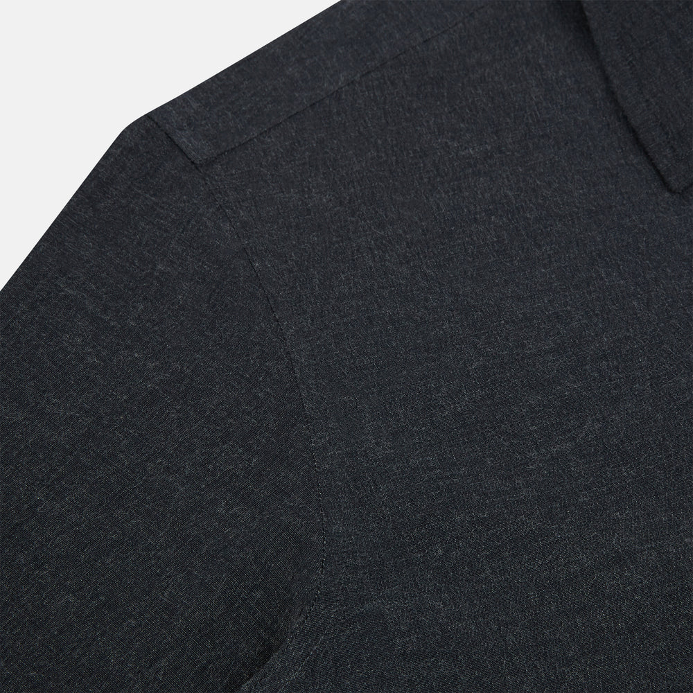 The Turnbull & Asser Midnight Blue Westminster Shirt features long sleeves, a button-up front, classic collar, and buttoned cuffs in a plain design—showcasing British craftsmanship—laid flat on a white background.