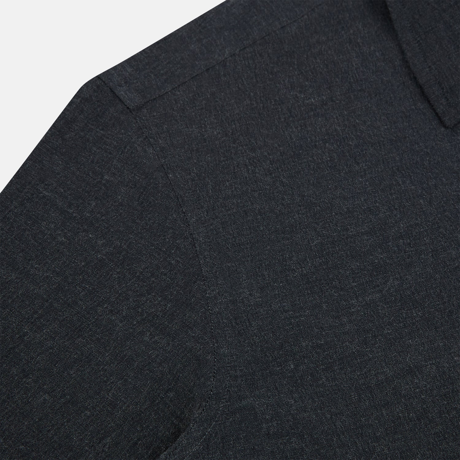 View 6 of product The Turnbull & Asser Midnight Blue Westminster Shirt features long sleeves, a button-up front, classic collar, and buttoned cuffs in a plain design—showcasing British craftsmanship—laid flat on a white background.