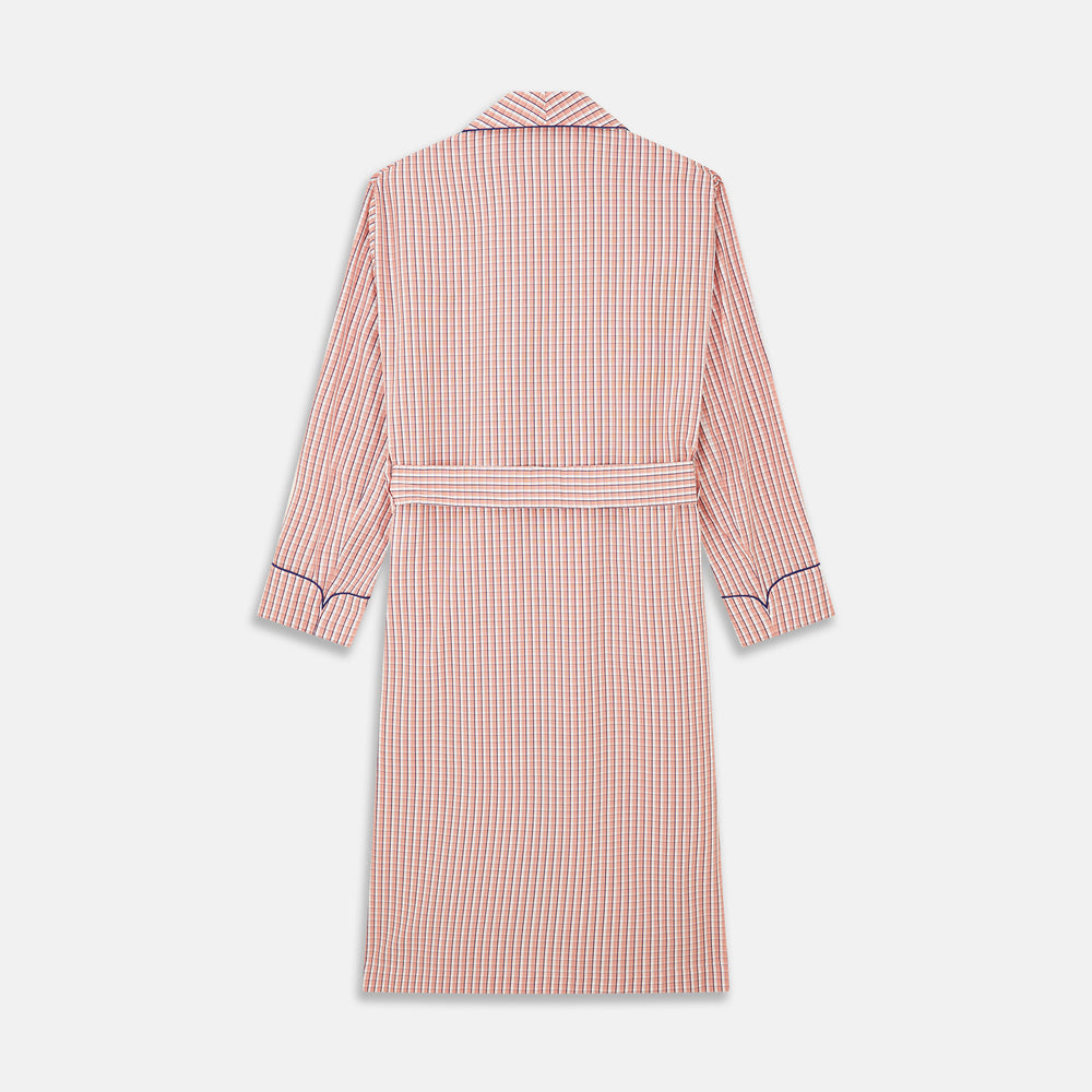 The Turnbull & Asser Orange Multi Check Cotton Arnold Gown features long sleeves, a shawl collar, wrap-around belt, and dark piping on the edges and pocket, displayed flat on a white background.