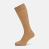 View 1 of product The Turnbull & Asser Rust Linen Mid-Length Sock is shown on a white background, featuring a ribbed texture for breathable comfort in everyday wear.