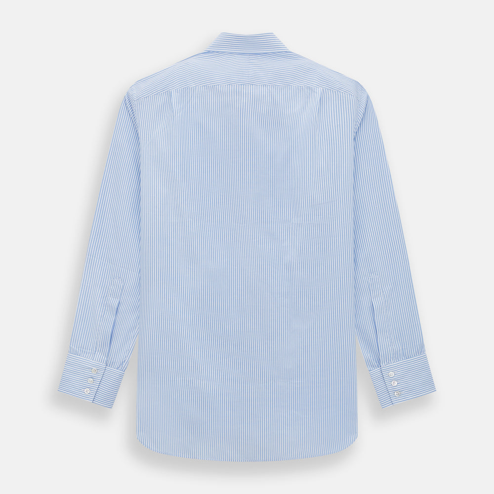 The Turnbull & Asser Blue Bengal Stripe Mayfair Shirt features light blue and white vertical stripes, a classic T&A collar, white buttons, and buttoned cuffs. Laid flat on a white background.