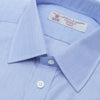 View 2 of product The Turnbull & Asser Blue End-on-End Cotton Shirt features a T&A collar, double cuffs, and white buttons—ideal for smart looks or pairing with a navy suit. Displayed against a plain white background.