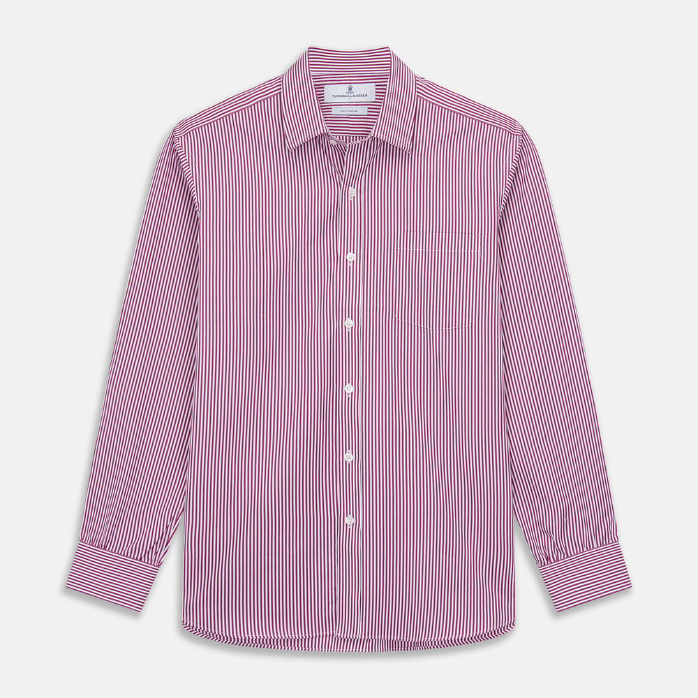 The Turnbull & Asser Purple & White Stripe Weekend Fit Shirt features a Derby collar, chest pocket, and 1-button cuffs—ideal for casual weekends.