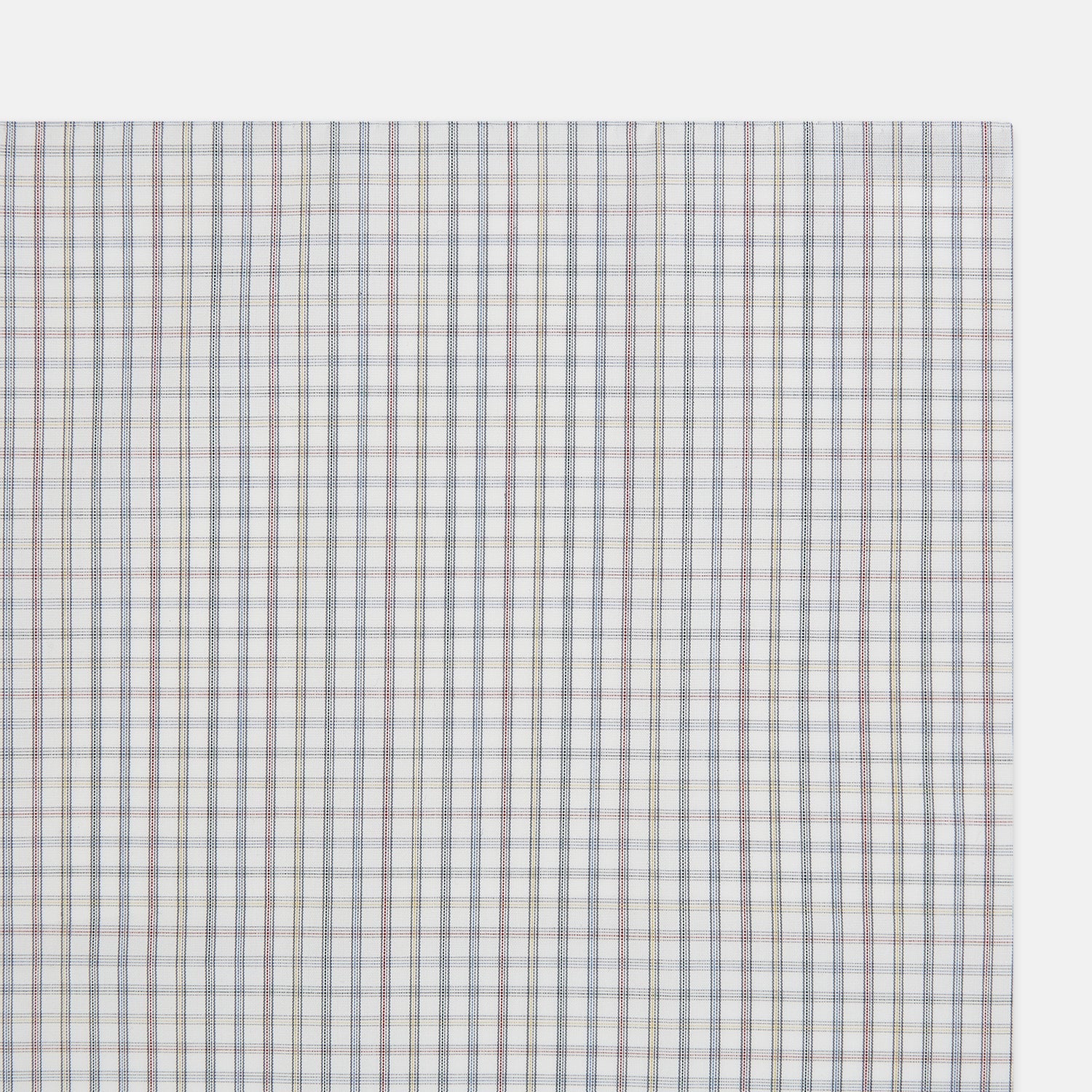View 2 of product The Sky Blue Multi Graph Check Hand-Rolled Handkerchief by Turnbull & Asser features thin blue, red, and beige lines forming small squares on white fabric. Crafted in England.