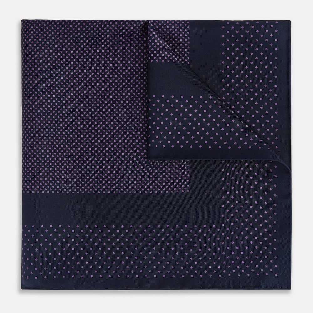 The Turnbull & Asser Navy and Purple Dot Silk Pocket Square features a stylish dot pattern—ideal for adding a refined touch to your look.