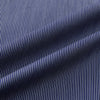 View 5 of product Turnbull & Asser’s Navy Stripe Highbury Overshirt with long sleeves, button-up front, black buttons, collar, and a left chest pocket is shown laid flat on a white background.