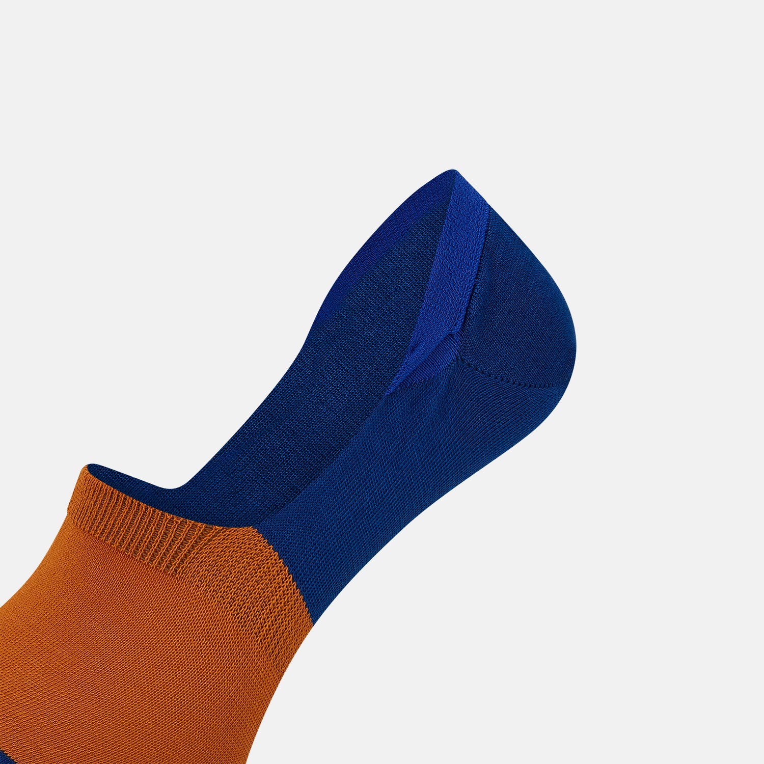 View 4 of product The Turnbull & Asser Royal Blue & Orange No-Show Socks are soft cotton, low-cut socks with a royal blue heel and toe, orange midsection, and blue lining, shown on a plain white background.
