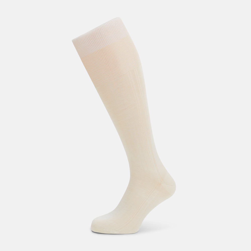 A single Turnbull & Asser Vanilla Silk Long Sock, knee-high and displayed upright, on a plain white background.