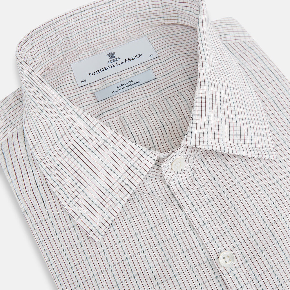 A long-sleeved, button-down BURGUNDY AND GREEN DOUBLE GRID CHECK WESTMINSTER SHIRT by Turnbull & Asser, featuring a classic collar and elegant check pattern—an outstanding piece of British craftsmanship.