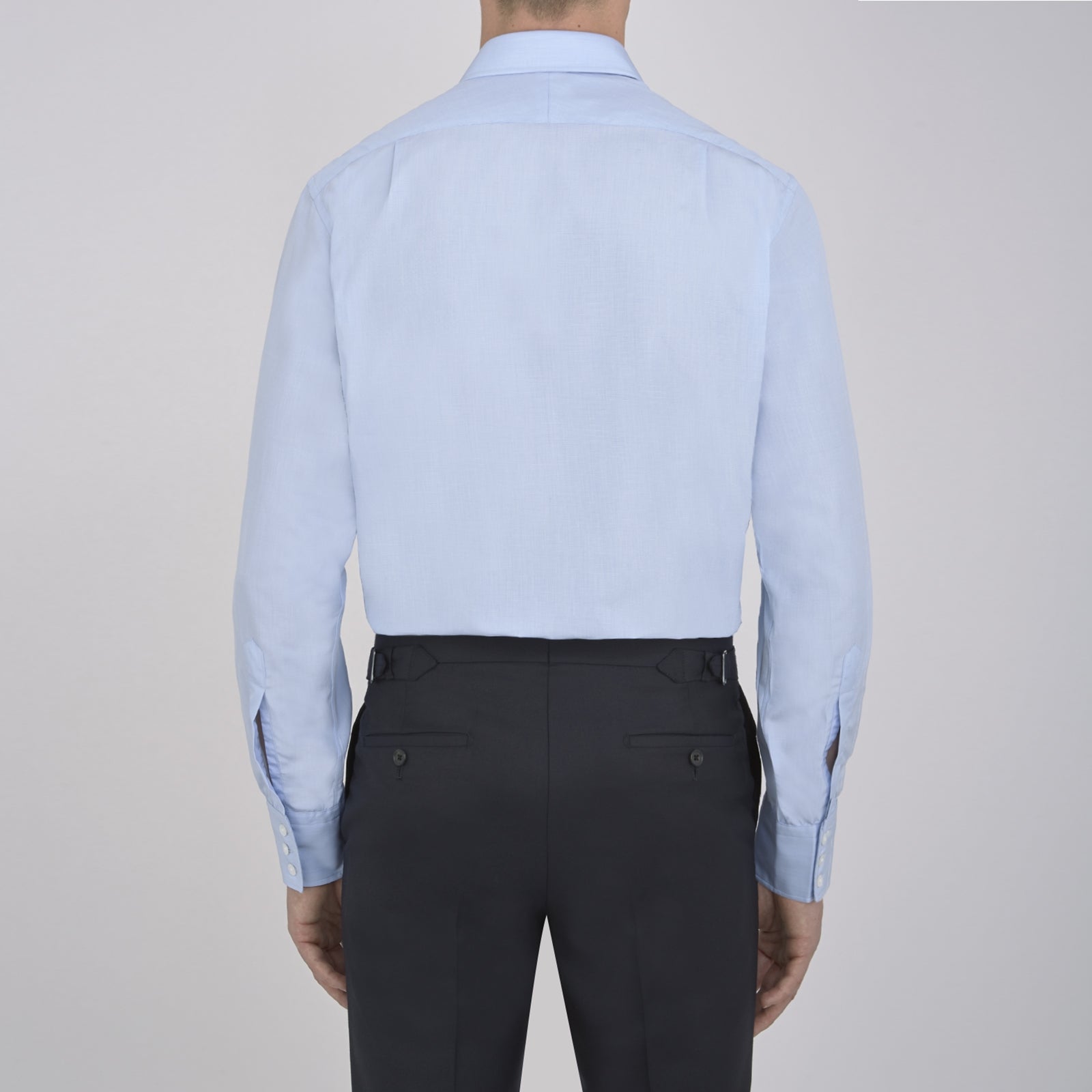 View 3 of product A Grey Cashmere Blend Shirt by Turnbull & Asser with a T&A collar and 3-button cuffs is neatly folded, showing its label, on a plain white background.