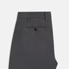 View 5 of product The Grey Henry B Trousers by Turnbull & Asser are straight-leg, feature belt loops, front pockets, a flat front, and are crafted from premium Italian cotton. Shown against a plain white background.