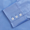 View 3 of product The World Is Not Enough Blue Cotton Istanbul Shirt by Turnbull & Asser, as seen on James Bond, features long sleeves, white buttons, a classic collar, and buttoned cuffs, shown against a plain white background.