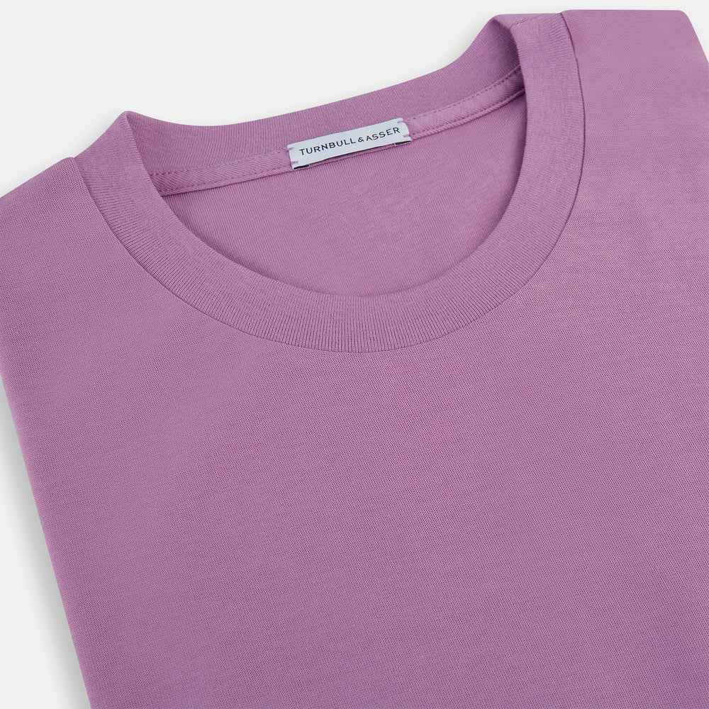 The Turnbull & Asser Mulberry Short-Sleeve T-shirt, shown on a white background, features a crew neck and clean lavender design with no logos or patterns, making it an ideal choice for everyday wear.
