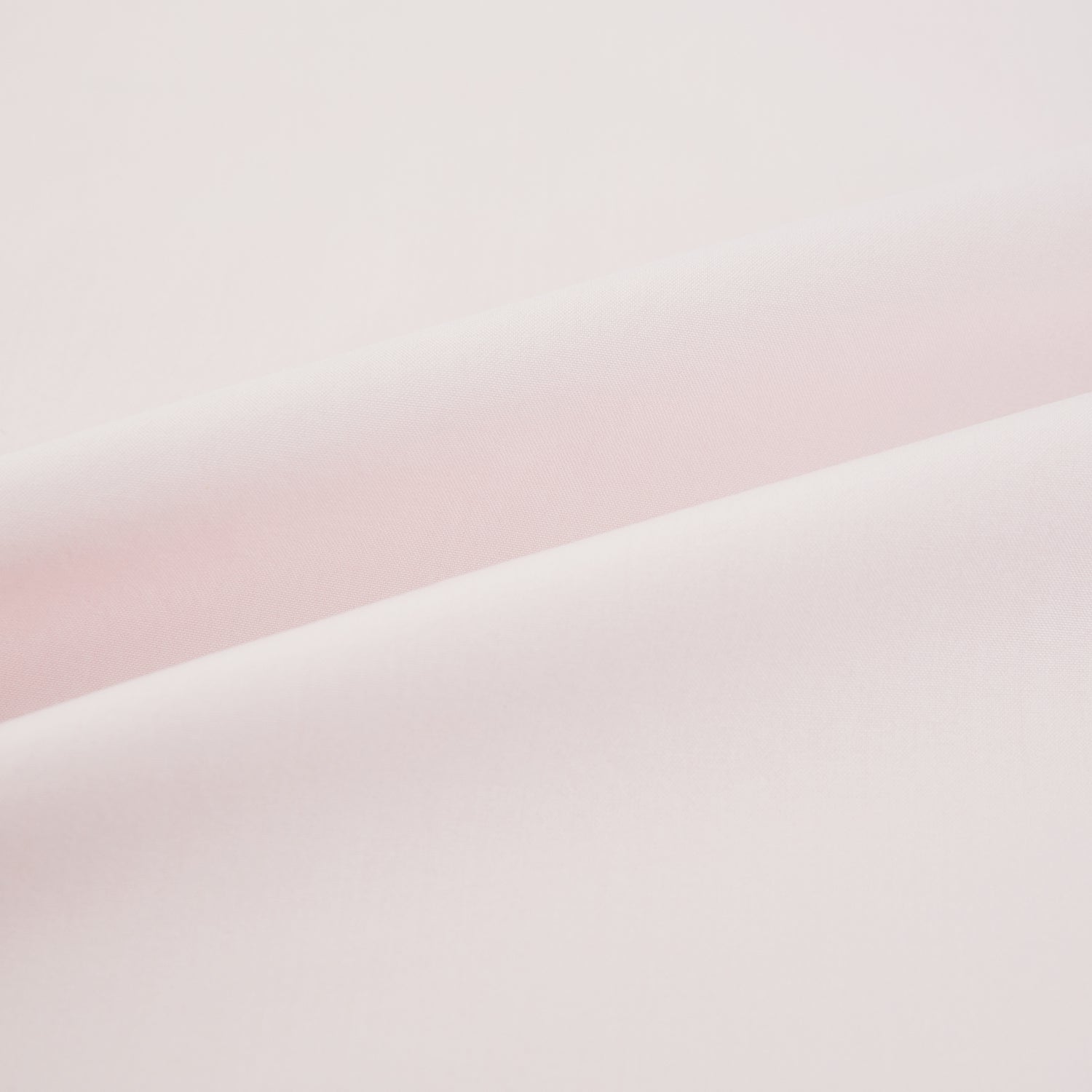 View 6 of product The Soft Pink Mayfair Shirt by Turnbull & Asser is a long-sleeved, sanforised cotton button-up with a classic collar, white buttons, and buttoned cuffs, shown against a plain white background.