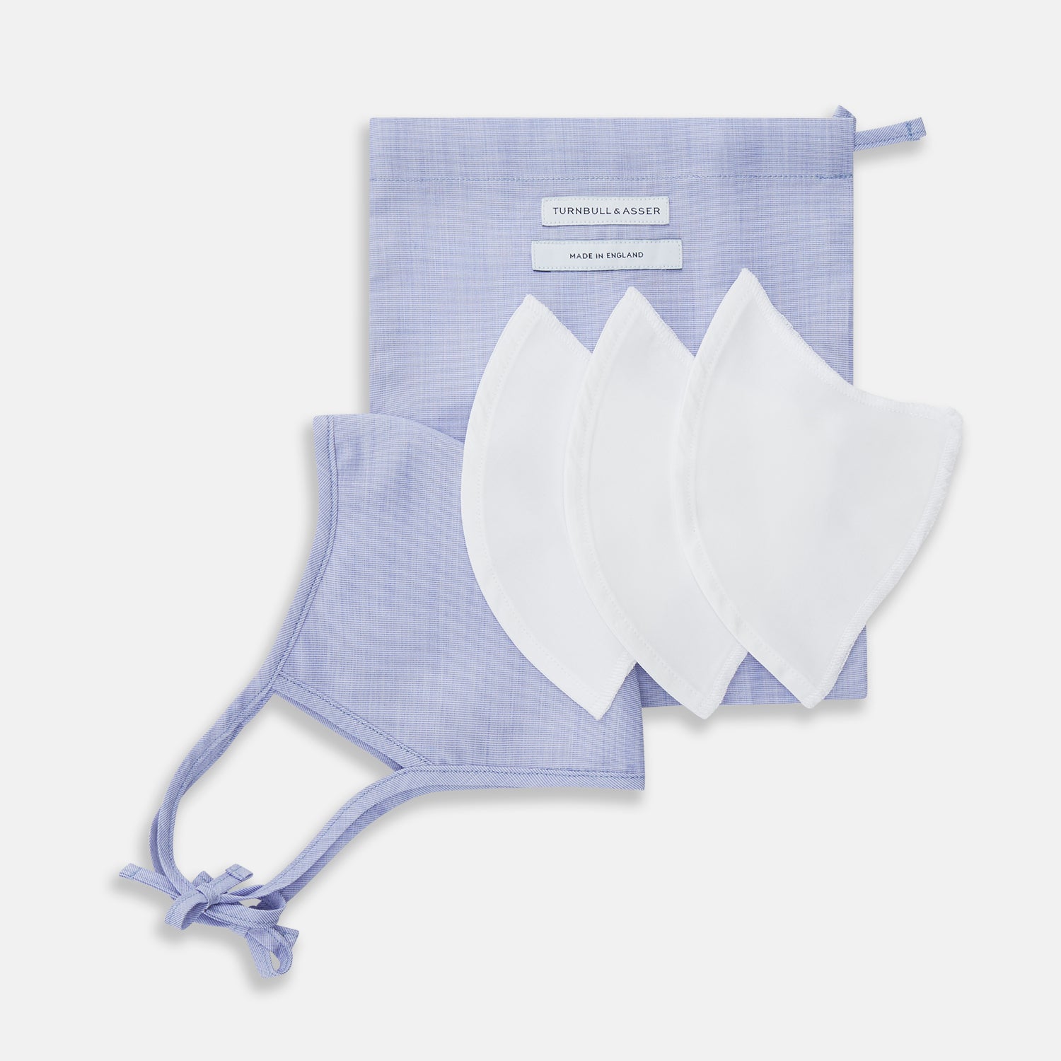 View 6 of product The Turnbull & Asser Plain Pale Blue Commuter Mask with 3 Viroformula™ filters features adjustable ear loops and side ties—ideal for daily use, shown against a white background.