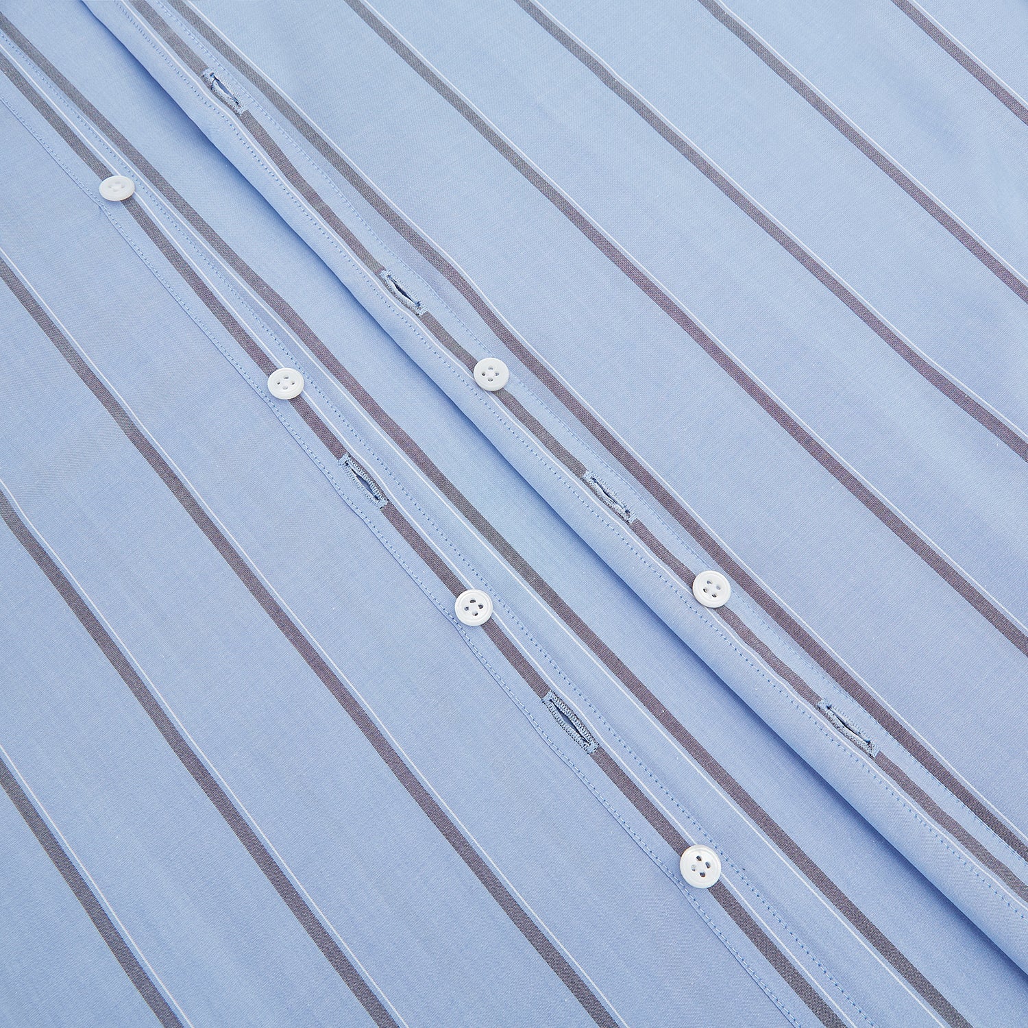 View 7 of product The Sky Blue Track Stripe Westminster Shirt by Turnbull & Asser features long sleeves, a Turnbull collar, and vertical dark blue and white stripes, displayed flat on a white surface.