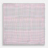 View 3 of product Turnbull & Asser’s Hand Rolled Red and Navy Graph Check Handkerchief—a white cotton accessory with red and navy grid lines, neatly folded for a touch of refined elegance.