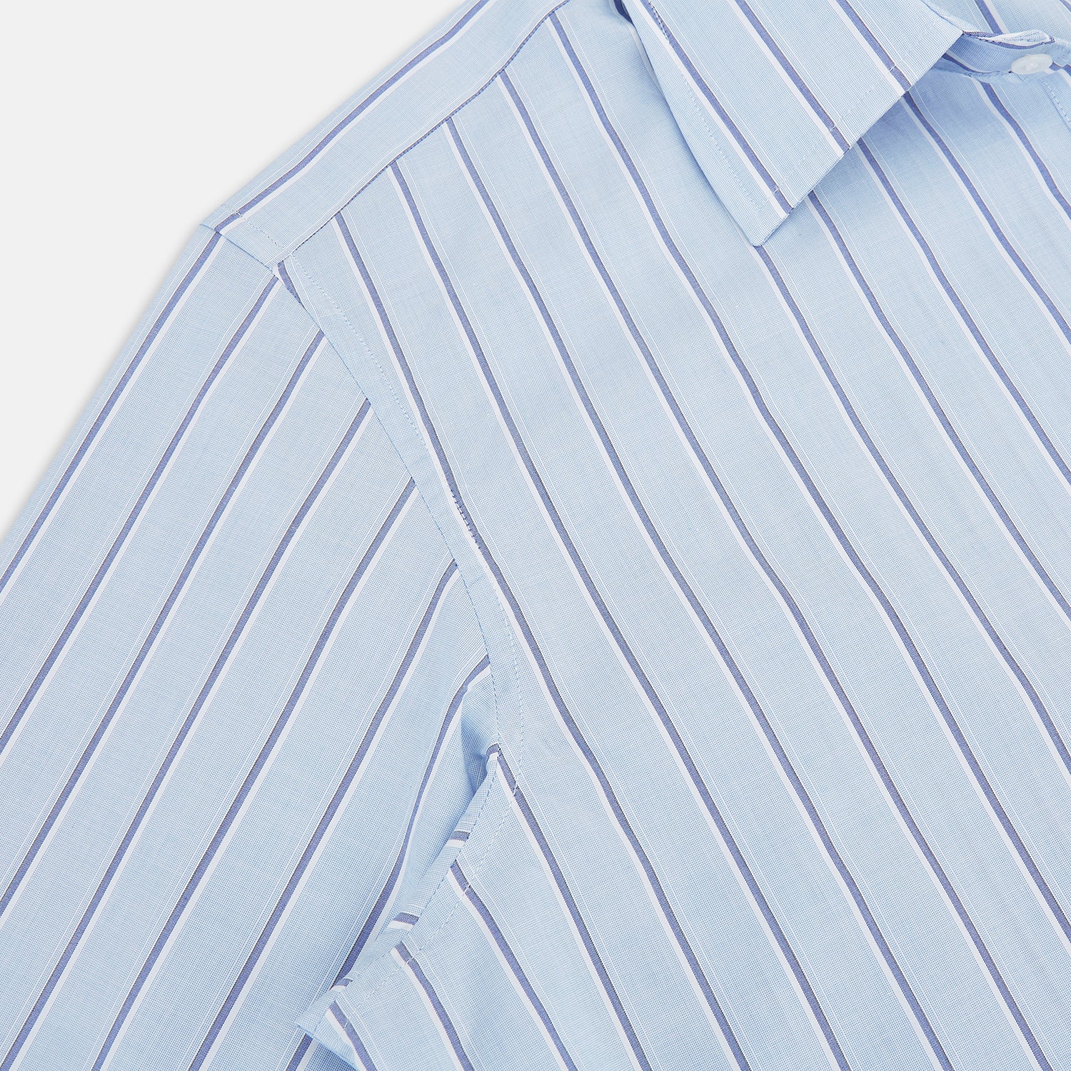 View 6 of product The Blue and Navy Multi-Stripe Westminster Shirt by Turnbull & Asser, featuring bold vertical stripes and a classic collar, exemplifies British craftsmanship and is shown laid flat on a white background.