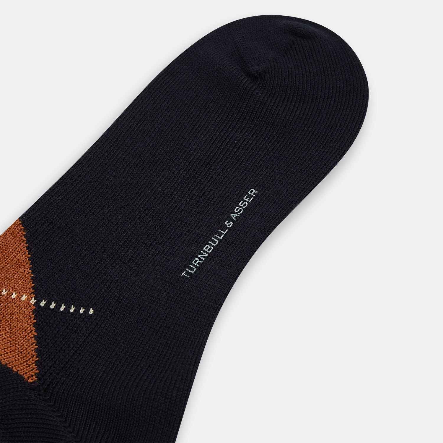 View 3 of product The Turnbull & Asser Navy/Green/Orange Wool Check Mid-Length Sock features a stylish check pattern and is shown on a white background.