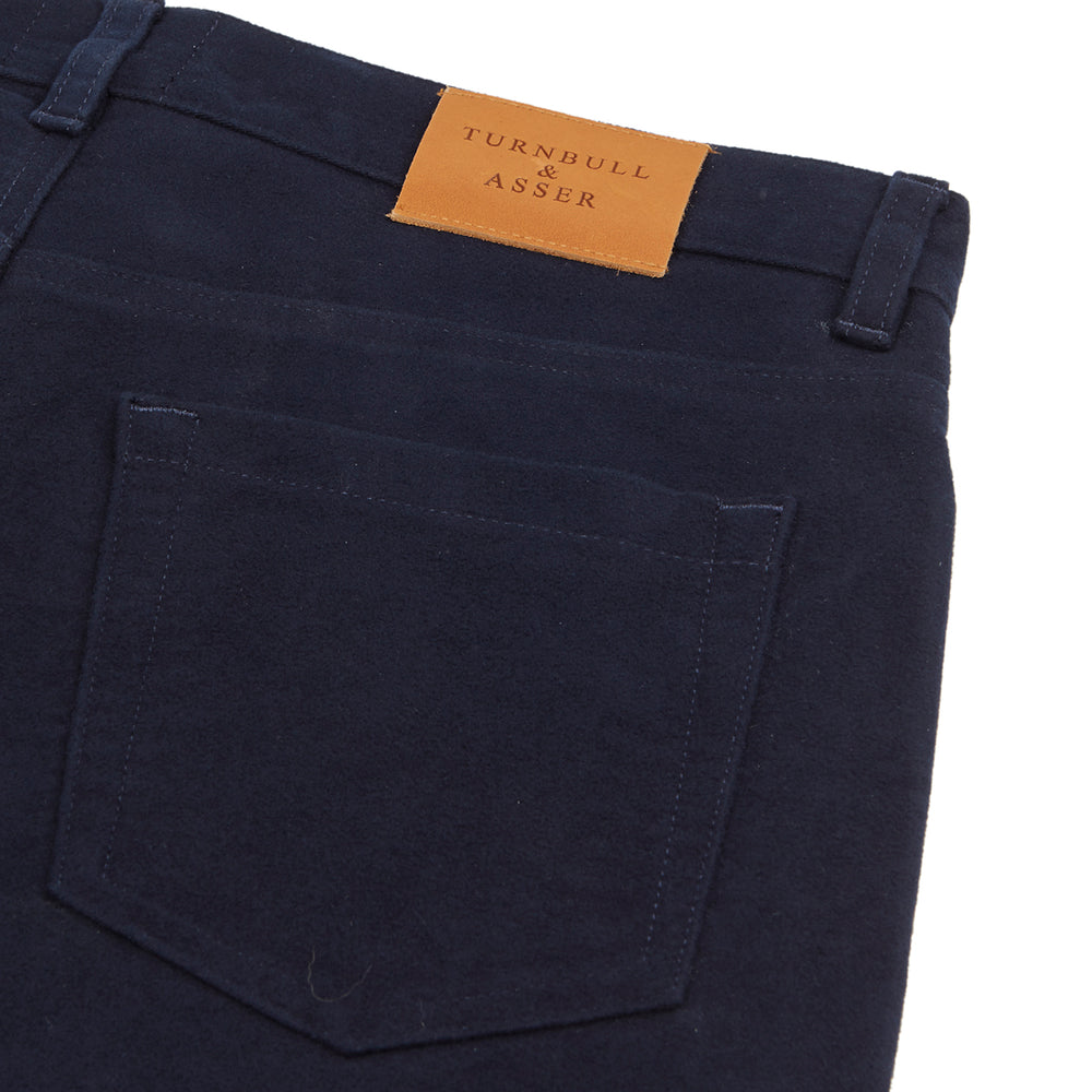 Turnbull & Asser Navy Moleskin Trousers featuring straight-leg design, front and back pockets, button closure, and belt loops, showcased on a plain white background.