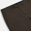 View 10 of product A pair of straight-leg Moss Green Winston Trousers by Turnbull & Asser in high-twist cotton with belt loops, button closure, and side pockets, displayed on a plain white background.