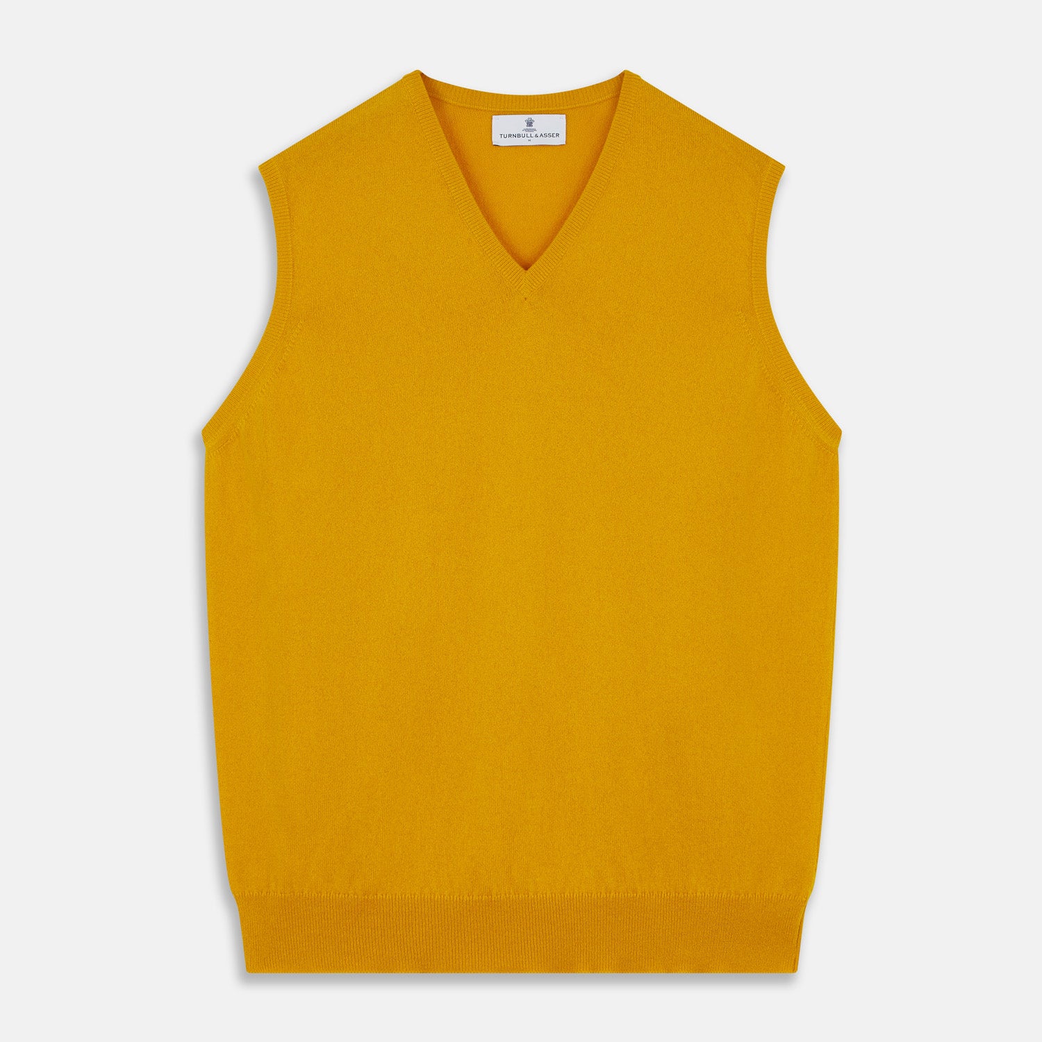 View 1 of product The Gold Ifor Cashmere Slipover by Turnbull & Asser is a sleeveless, V-neck knit in bright mustard yellow, made in Scotland and shown laid flat against a white background.