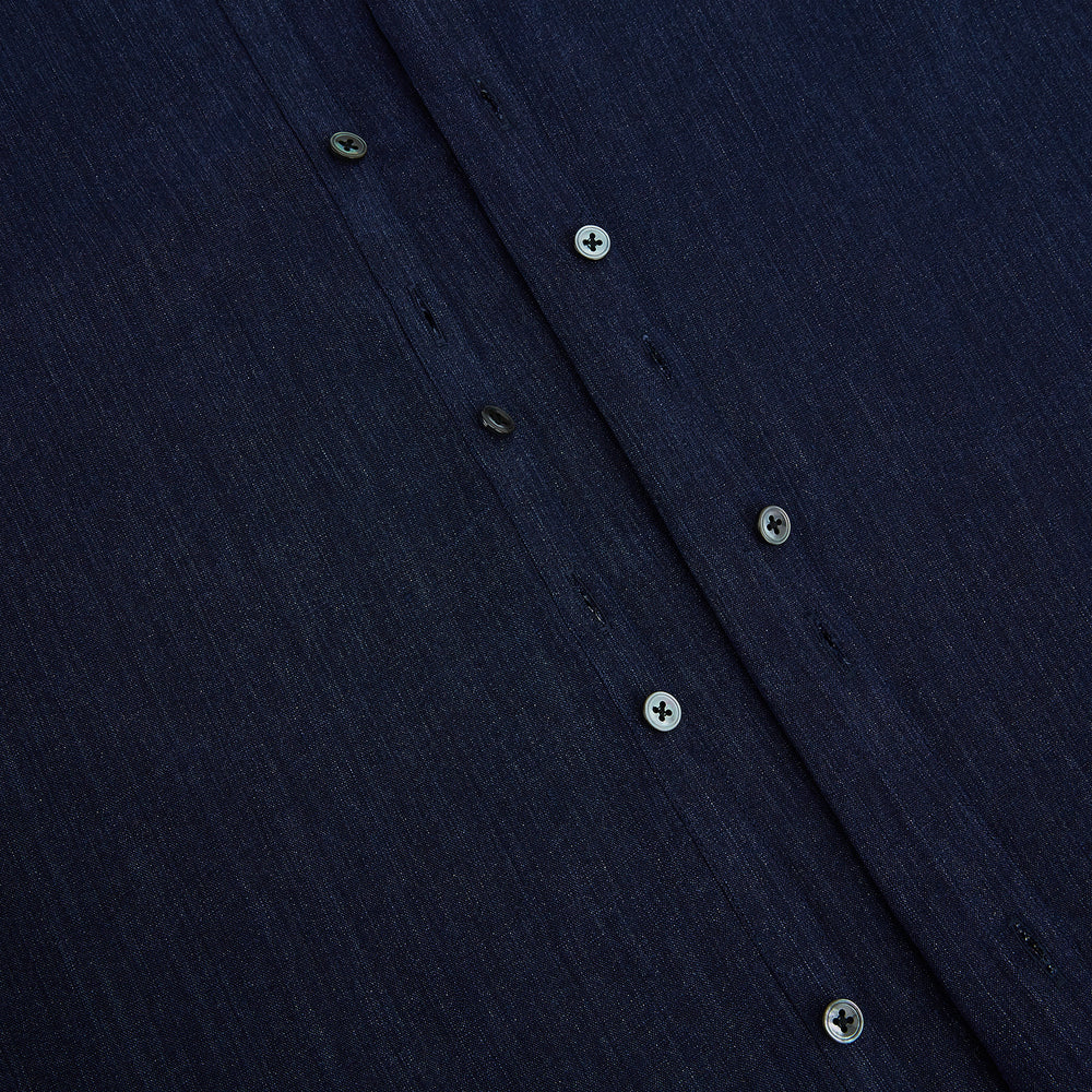 The Navy Linen Westminster Shirt by Turnbull & Asser features a classic collar and buttoned cuffs, exemplifying British craftsmanship. Shown here in long sleeves, the shirt is displayed flat against a white background.